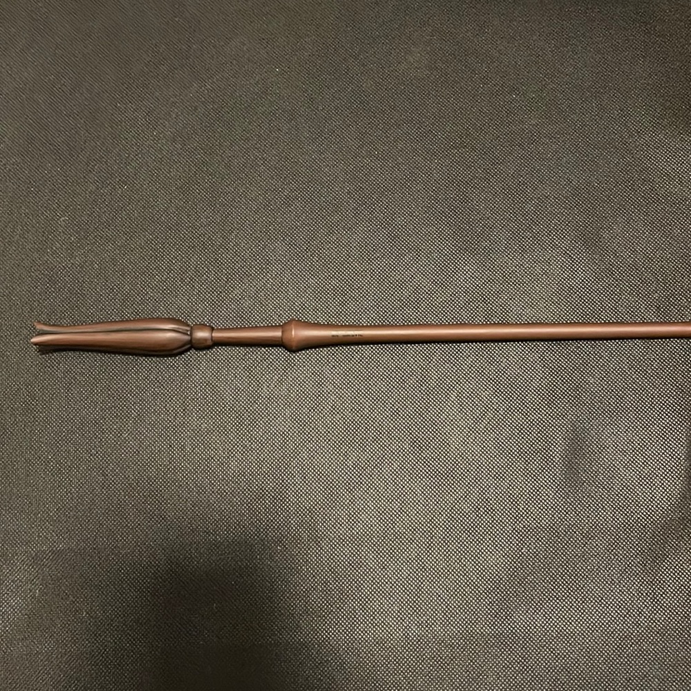 Luna Lovegood Harry Potter interacting Universal Studios wand.